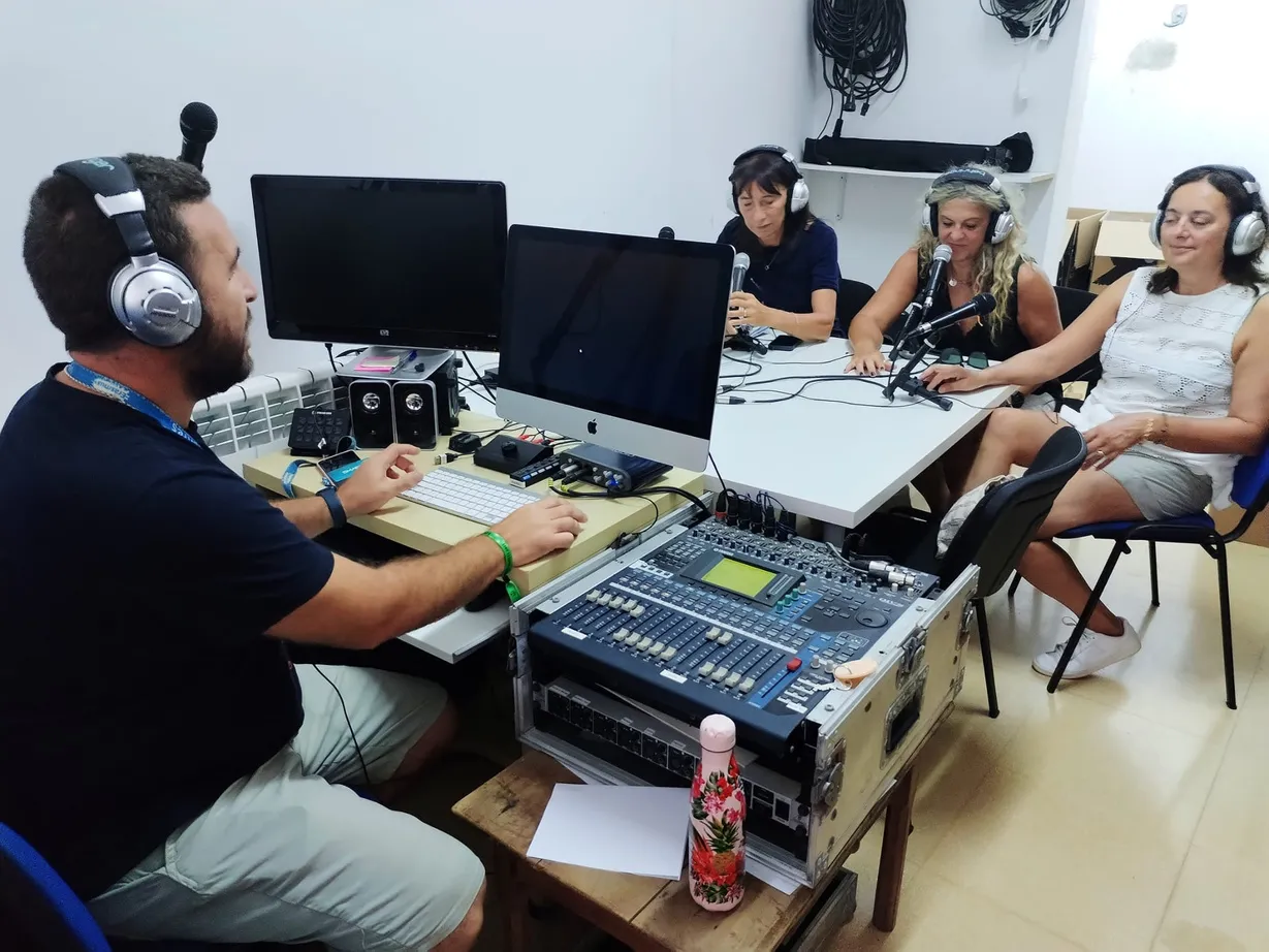 Participants recording a podcast episode during the School Radio course